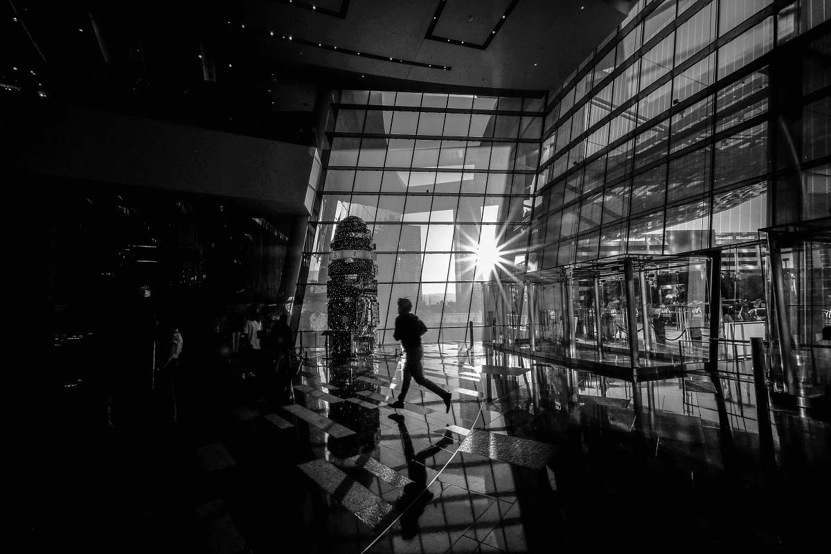 las vegas greyscale photo of man running inside room united states